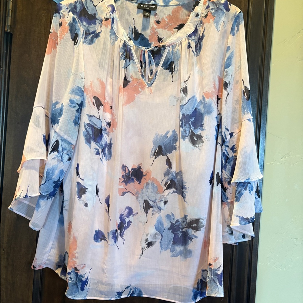 I.N. Studio Pink Flutter Sleeve Blouse with floral design.